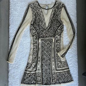 Free people midi dress with long sleeve, size 6.